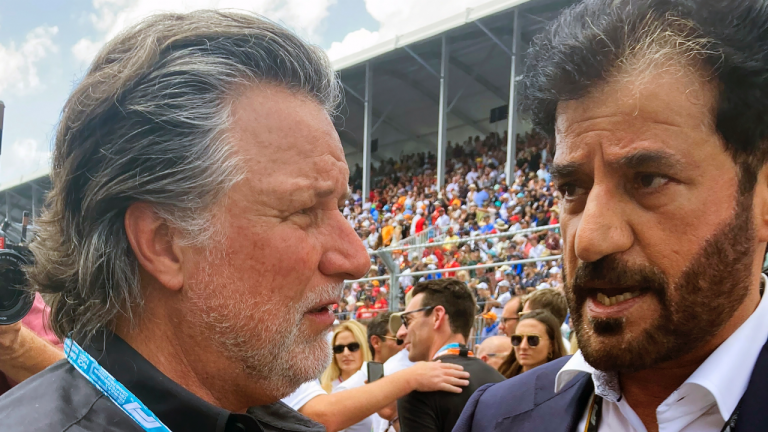 FILE - Michael Andretti, left, talks with FIA President Mohammed bin Sulayem before the Formula One Miami Grand Prix auto race at Miami International Autodrome, Sunday, May 8, 2022, in Miami Gardens, Fla. The FIA has received “more than five” expressions of interest from teams interested in joining Formula One, the president of the governing body told The Associated Press on Wednesday, July 5, 2023, with a decision on expansion expected by the end of the month. The bid that stands out most to Mohammed Ben Sulayem is from Andretti Global and General Motors — a supportive sign that Michael Andretti may indeed get the F1 team he's been fiercely chasing. (AP Photo/Jenna Fryer, File)