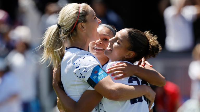 United States midfielder Lindsey Horan, left, and Sophia Smith, center, celebrate with forward Trinity Rodman, right, who scored in the second half of a FIFA Women's World Cup send-off soccer match against Wales in San Jose, Calif., Sunday, July 9, 2023. (AP)