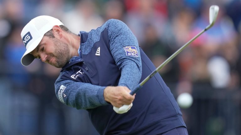 Canada's Corey Conners play his tee shot on the fourth hole during the third day of the Open Championship at the Royal Liverpool Golf Club in Hoylake, England, Saturday, July 22, 2023. (Kin Cheung/AP) 