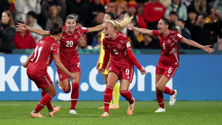 Denmark's Amalie Vangsgaard , centre, celebrates after scoring the opening goal during the Women's World Cup Group D soccer match between Denmark and China at Perth Rectangular Stadium, in Perth, Australia, Saturday, July 22, 2023. (Gary Day/AP) 