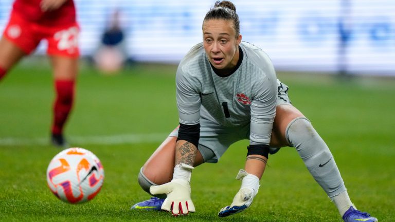 Canada's goalkeeper Kailen Sheridan takes the ball during a friendly soccer international between Canada and Australia in Sydney, Australia, Tuesday, Sept. 6, 2022. (Rick Rycroft/AP)