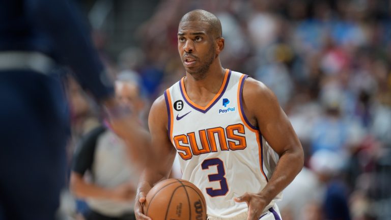 Phoenix Suns guard Chris Paul looks to pass the ball in the second half of Game 2 of an NBA second-round playoff series against the Denver Nuggets Monday, May 1, 2023, in Denver. (David Zalubowski/AP)