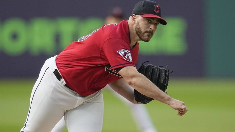 Cleveland Guardians' Aaron Civale pitches to a Kansas City Royals batter during the first inning of a baseball game Tuesday, July 25, 2023, in Cleveland. (Sue Ogrocki/AP)