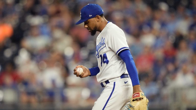 Kansas City Royals relief pitcher Jose Cuas reacts after walking in a run during the eighth inning of a baseball game against the Detroit Tigers. (Charlie Riedel/AP)