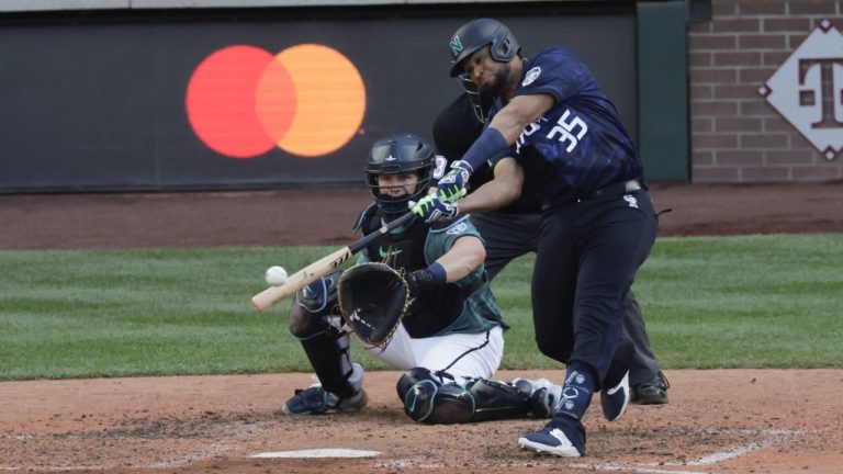 National League's Elias Díaz, of the Colorado Rockies (35), hits a two run home run in the eighth inning during the MLB All-Star baseball game in Seattle, Tuesday, July 11, 2023. (John Froschauer/AP)