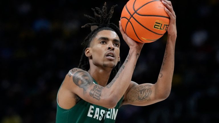 Eastern Michigan forward Emoni Bates plays during the second half of an NCAA college basketball game, Friday, Nov. 11, 2022, in Detroit. Tabbed the “next Kevin Durant” even before he graced the cover of Sports Illustrated as a high school sophomore in Michigan, Bates is no longer trying to live up to the expectations of others and simply following his own path, albeit not the one he imagined. (AP Photo/Carlos Osorio, File)