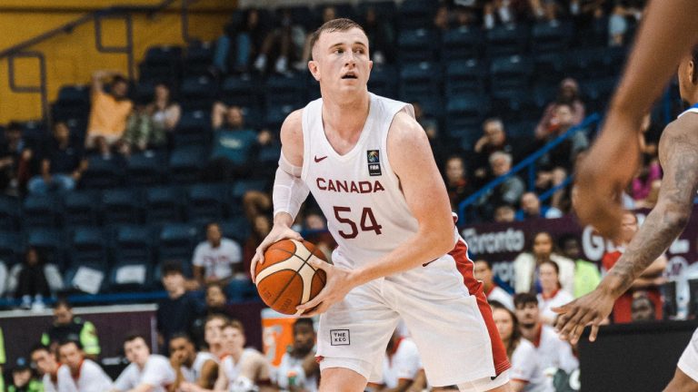 Thomas Kennedy holds the ball during Canada's game against USA on July 13, 2023 at GLOBL JAM in Toronto, Ont. (Photo credit: Canada Basketball)