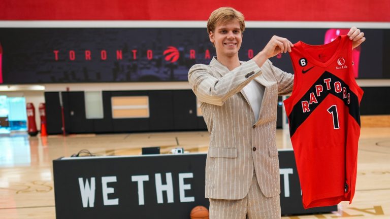 Toronto Raptors first round draft pick Gradey Dick poses for photos with a jersey after being introduced to the media in Toronto, Monday, June 26, 2023. THE CANADIAN PRESS/Andrew Lahodynskyj