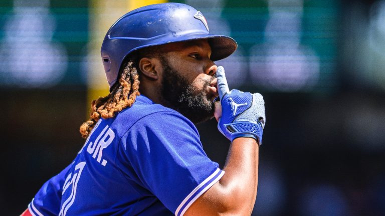 Toronto Blue Jays' Vladimir Guerrero Jr. gestures as he rounds the bases after hitting a two-run home run during the fourth inning of a baseball game against the Seattle Mariners, Sunday, July 23, 2023, in Seattle. (Caean Couto/AP)