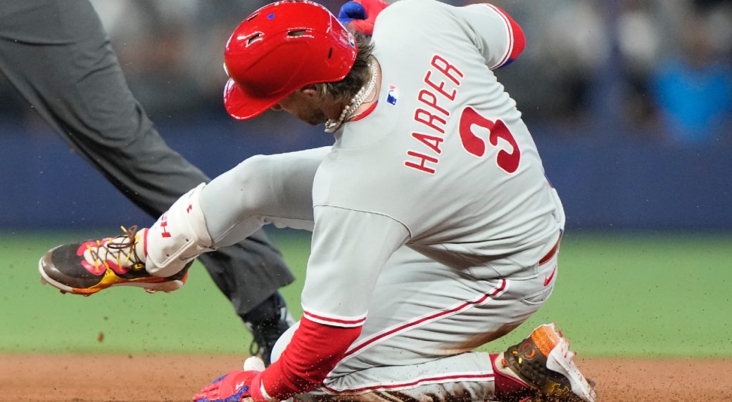 Phillies' Bryce Harper hit on surgically repaired elbow by pitch, leaves  game