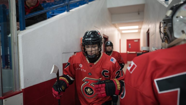 Shiann Darkangelo of the Toronto Six of the Premier Hockey Federation makes her way to the ice for warm up before playing the Connecticut Whale in Toronto on Saturday, Jan. 21, 2023. (Tijana Martin/CP)