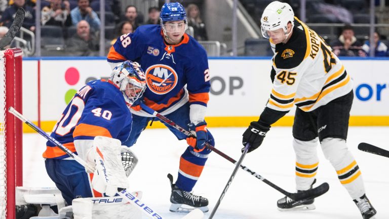 New York Islanders goaltender Semyon Varlamov (40) stops a shot on goal by Boston Bruins' Joona Koppanen (45) during the third period of an NHL hockey game Wednesday, Jan. 18, 2023, in Elmont, N.Y. (Frank Franklin II/AP)