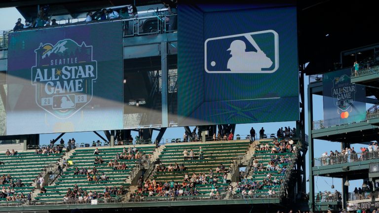 The logo for the 2023 MLB All-Star Game, which will be played in Seattle, is unveiled Friday, July 22, 2022, at T-Mobile Park before a baseball game between the Seattle Mariners and the Houston Astros in Seattle. (Ted S. Warren/AP)