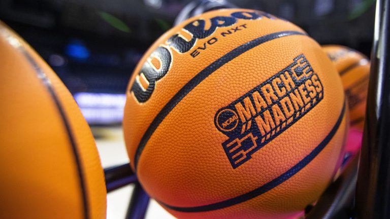 A basketball with a March Madness logo rests on a rack before a First Four game between Illinois and Mississippi State in the NCAA women's basketball tournament Wednesday, March 15, 2023, in South Bend, Ind. (Michael Caterina/AP)