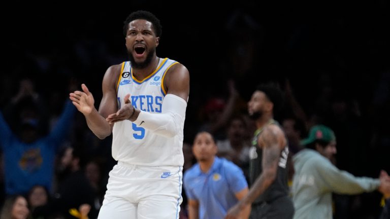 Los Angeles Lakers guard Malik Beasley (5) celebrates after making a 3-point basket against the Minnesota Timberwolves during the second half of an NBA basketball game Friday, March 3, 2023, in Los Angeles. (Marcio Jose Sanchez/AP)