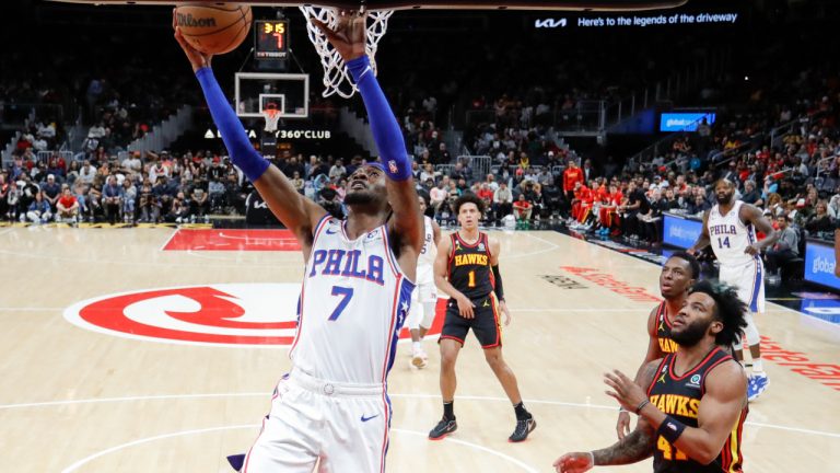 Philadelphia 76ers forward Jalen McDaniels, left, shoots next to Atlanta Hawks forward Saddiq Bey, right, during the first half of an NBA basketball game Friday, April 7, 2023, in Atlanta. (Alex Slitz/AP)