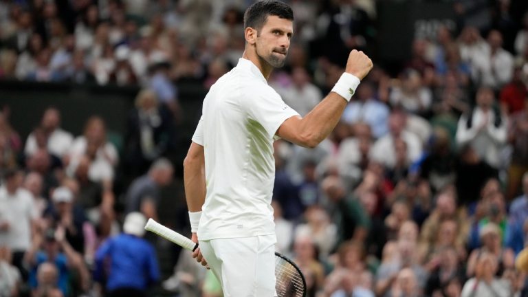 Serbia's Novak Djokovic reacts as he wins the first set against Poland's Hubert Hurkacz in a men's singles match on day seven of the Wimbledon tennis championships in London, Sunday, July 9, 2023. (Kirsty Wigglesworth/AP)