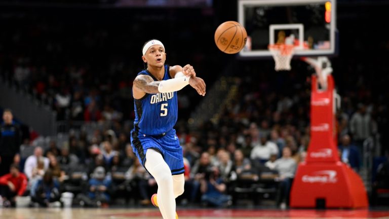 Orlando Magic forward Paolo Banchero (5) plays during the second half of an NBA basketball game against the Washington Wizards, Friday, March 31, 2023, in Washington. NBA rookie of the year Paolo Banchero of the Orlando Magic revealed why he chose to play for USA Basketball instead of Italy at this summer's FIBA World Cup. (AP Photo/Nick Wass, File)