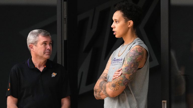 Phoenix Mercury WNBA basketball All-Star centre Brittney Griner, right, talks with Mercury general manager Jim Pitman prior to a news conference Monday, June 26, 2023, in Phoenix. (Ross D. Franklin/AP)