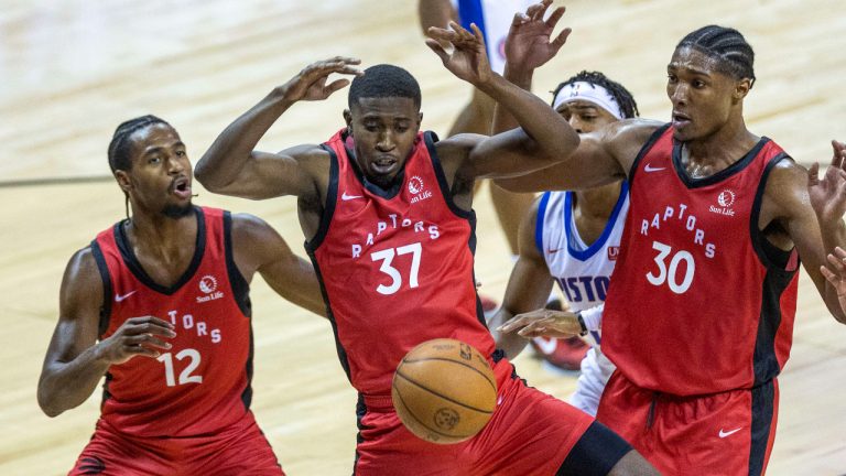 Toronto Raptors guard Darryl Morsell (37), guard RJ Nembhard (12) and center David McCormack (30) watch the ball get away during the second half of the team's NBA summer league basketball game against the Detroit Pistons on Wednesday, July 12, 2023, in Las Vegas. (AP)