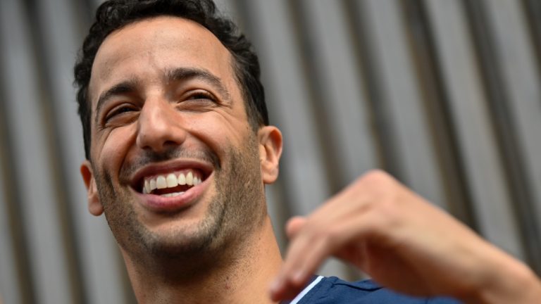 Australian Formula One driver Daniel Ricciardo of Scuderia AlphaTauri smiles in the paddock ahead of the Hungarian Formula One Grand Prix at the Hungaroring racetrack in Mogyorod, near Budapest, Hungary, Thursday, July 20, 2023. The Hungarian F1 Grand Prix is held on Sunday, July 23, 2023. (AP Photo/Denes Erdos)