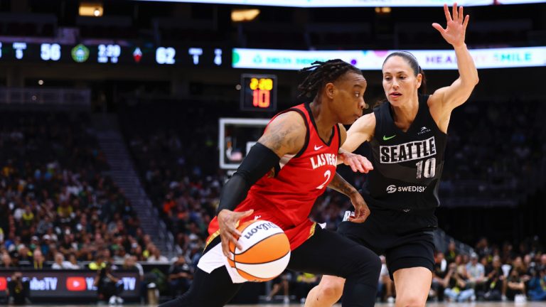 Las Vegas Aces guard Riquna Williams (2) drives against Seattle Storm guard Sue Bird (10) during the second half of Game 4 of a WNBA basketball playoffs semifinal Tuesday, Sept. 6, 2022, in Seattle. (Lindsey Wasson/AP)