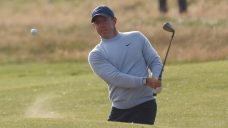 Bunker save at the last hole helps McIlroy stay alive at the Open Championship