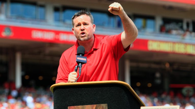 Former Cincinnati Reds first baseman Sean Casey speaks during ceremonies enshrining him into the team's Hall of Fame prior to a baseball game between the Cincinnati Reds and the Minnesota Twins, Saturday, June 23, 2012, in Cincinnati. The New York Yankees have hired 12-year big league veteran Sean Casey as their hitting coach for the remainder of this season, a person with knowledge of the situation told The Associated Press. The person spoke to the AP on condition of anonymity because the deal has not been formally announced. Casey, 49, has been working for MLB Network as an analyst.(Al Behrman/AP)