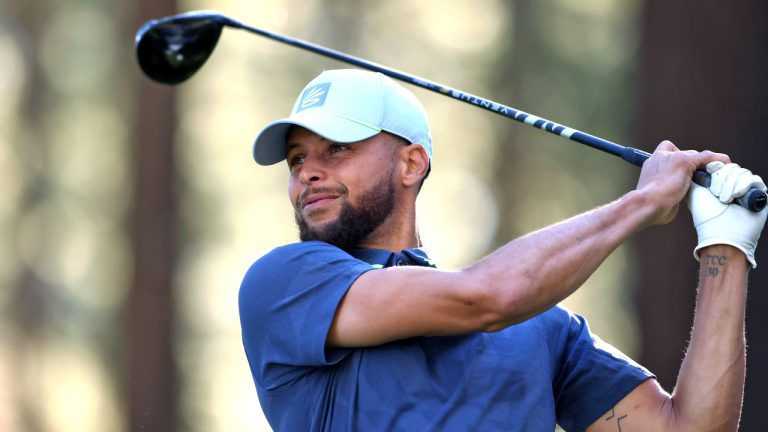 Stephen Curry watches a tee shot on the 16th hole during a practice round at American Century Championship golf tournament Wednesday, July 12, 2023, in South Lake Tahoe, Nev. (Scott Strazzante/San Francisco Chronicle via AP)