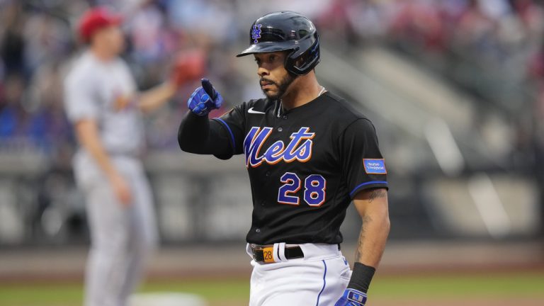 New York Mets' Tommy Pham (28) gestures to teammates after hitting an RBI single against the St. Louis Cardinals during the third inning of a baseball game Friday, June 16, 2023, in New York. (Frank Franklin II/AP)