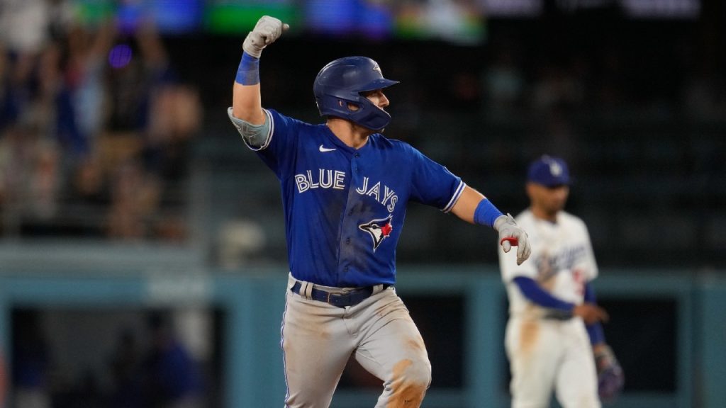 Varsho drills clutch double in extras, plates pair to push Blue Jays ahead