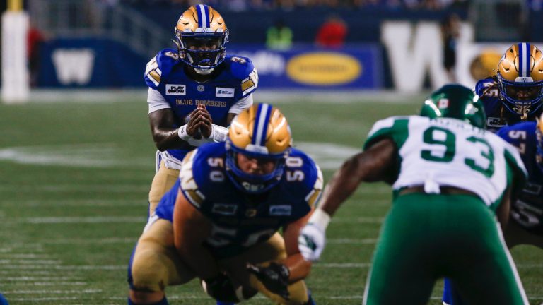 Winnipeg Blue Bombers quarterback Tyrrell Pigrome (3) waits for the ball against the Saskatchewan Roughriders during second half CFL action in Winnipeg Friday, June 2, 2023. (John Woods/CP)