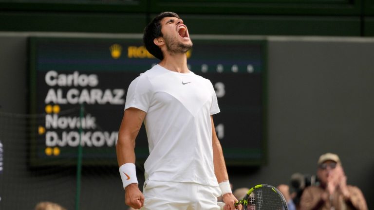 Spain's Carlos Alcaraz celebrates after winning a point against Serbia's Novak Djokovic in the final of the men's singles on day fourteen of the Wimbledon tennis championships in London, Sunday, July 16, 2023. (Kirsty Wigglesworth/AP Photo)