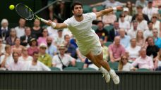 Alcaraz among those playing day after day at rainy Wimbledon