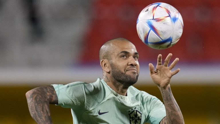 FILE - Brazil's Dani Alves practises during a training session at the Grand Hamad stadium in Doha, Qatar, on Dec. 4, 2022. A judge has decided to indict Brazilian soccer player Dani Alves following an investigation into sexual assault accusations against him, a Spanish court said Monday, July 31, 2023. The judge concluded the investigation and found evidence of wrongdoing by Alves, who has been in jail since being provisionally detained in January on accusations that he sexually assaulted a woman at a nightclub in Barcelona on Dec. 30. (Andre Penner/AP)