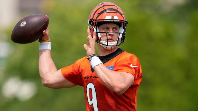 Cincinnati Bengals quarterback Joe Burrow (9) participates in a drill during the NFL football team's training camp, Thursday, July 27, 2023, in Cincinnati. (Jeff Dean/AP)