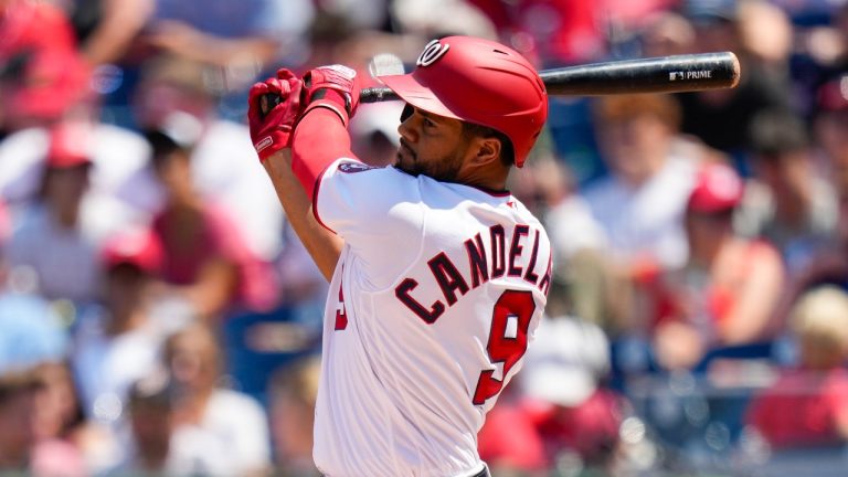 Washington Nationals third baseman Jeimer Candelario (9) bats during a baseball game against the San Francisco Giants at Nationals Park, Sunday, July 23, 2023, in Washington. (Alex Brandon/AP Photo)