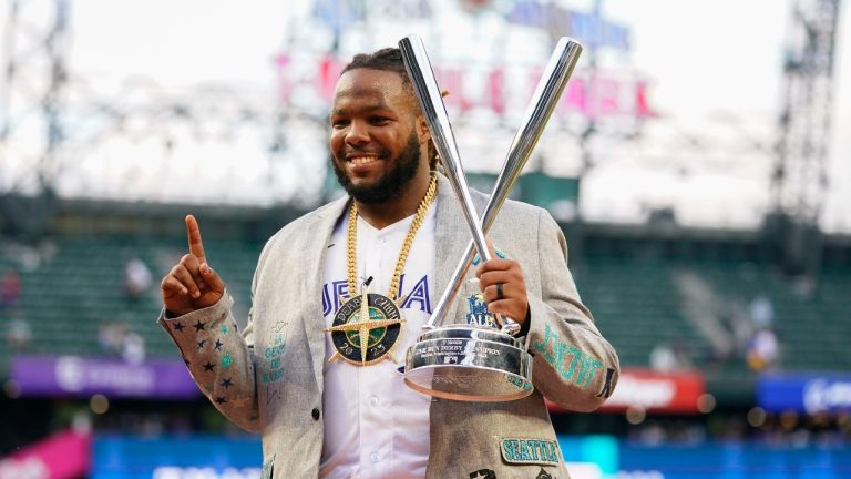 Vladimir Guerrero Jr., of the Toronto Blue Jays, holds his trophy after winning the MLB All-Star baseball Home Run Derby in Seattle, Monday, July 10, 2023. (Lindsey Wasson/AP Photo)