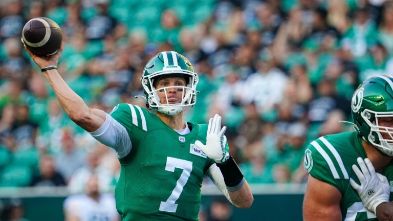 Saskatchewan Roughriders quarterback Trevor Harris (7) throws against the Edmonton Elks during the first half of CFL football action in Regina, on Thursday, July 6, 2023. (Heywood Yu/CP)