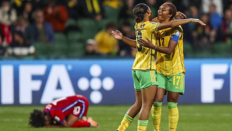 Jamaica's Allyson Swaby, right, and Tiernny Wiltshire celebrate at the end of the Women's World Cup Group F soccer match between Panama and Jamaica in Perth, Australia. (Gary Day/AP)
