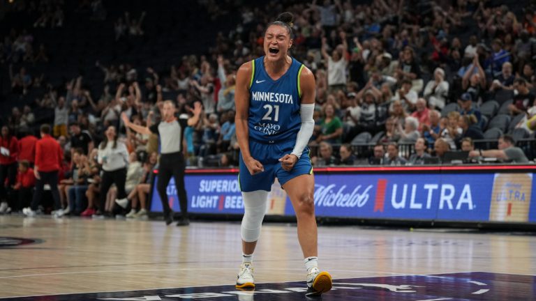 Minnesota Lynx guard Kayla McBride (21) celebrates making long jump shot in the last second of the first half of a WNBA basketball game against the Washington Mystics, Wednesday, July 26, 2023, at the Target Center in Minneapolis, Minn. (Renée Jones Schneider/Star Tribune via AP)