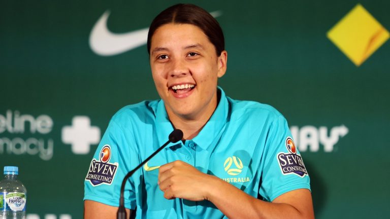 Australia's Women's World Cup captain Sam Kerr reacts during a press conference in Brisbane, Australia, Saturday, July 29, 2023. Kerr says she'll be available for Australia's must-win Women's World Cup game against Olympic champion Canada after missing the team's first two group games because of a calf muscle injury. (Tertius Pickard/AP)