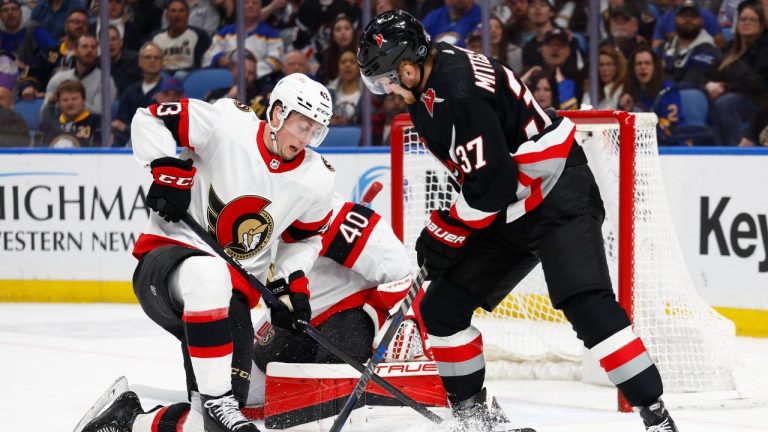 Ottawa Senators defenseman Tyler Kleven (43) blocks a shot by Buffalo Sabres center Casey Mittelstadt (37) during the first period of an NHL hockey game, Thursday, April 13, 2023, in Buffalo, N.Y. (Jeffrey T. Barnes/AP Photo)