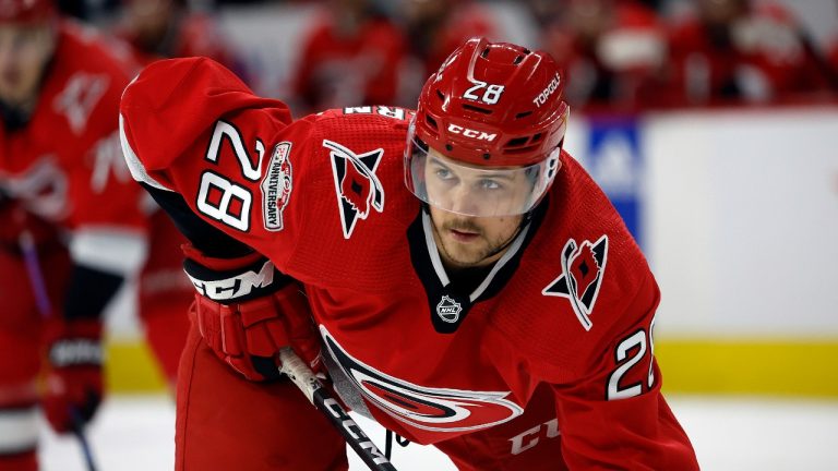 Carolina Hurricanes' Mackenzie MacEachern (28) waits for a face-off against the New Jersey Devils during the second period of Game 5 of an NHL hockey Stanley Cup second-round playoff series in Raleigh, N.C., Thursday, May 11, 2023. (Karl B DeBlaker/AP)