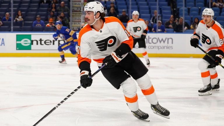 Philadelphia Flyers center Zack MacEwen (17) carries the puck during the first period of an NHL preseason hockey game against the Buffalo Sabres, Tuesday, Sept. 27, 2022, in Buffalo, N.Y. (Jeffrey T. Barnes/AP)