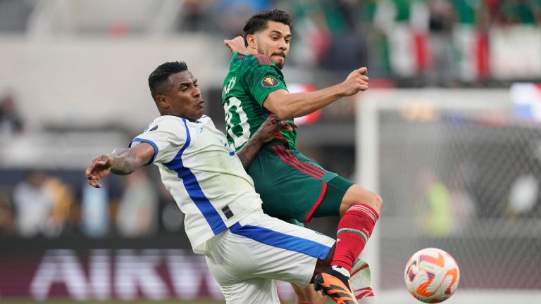 Panama's Harold Cummings, left, defends on Mexico's Henry Martin during the second half of the CONCACAF Gold Cup final soccer match Sunday, July 16, 2023, in Inglewood, Calif. (Mark J. Terrill/AP)