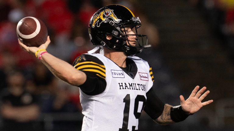 Hamilton Tiger-Cats quarterback Bo Levi Mitchell attempts a pass during first half CFL action against the Ottawa Redblacks, Friday, July 28, 2023 in Ottawa. (Adrian Wyld/CP)