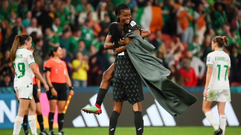 Nigeria's Blessing Demehin, back, celebrate with Nigeria's Osinachi Ohale after the Women's World Cup Group B soccer match between Ireland and Nigeria. (Tertius Pickard/AP)