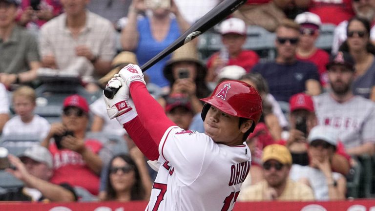 Los Angeles Angels' Shohei Ohtani follows through as he hits a solo home run during the first inning of a baseball game against the Pittsburgh Pirates. (Mark J. Terrill/AP)