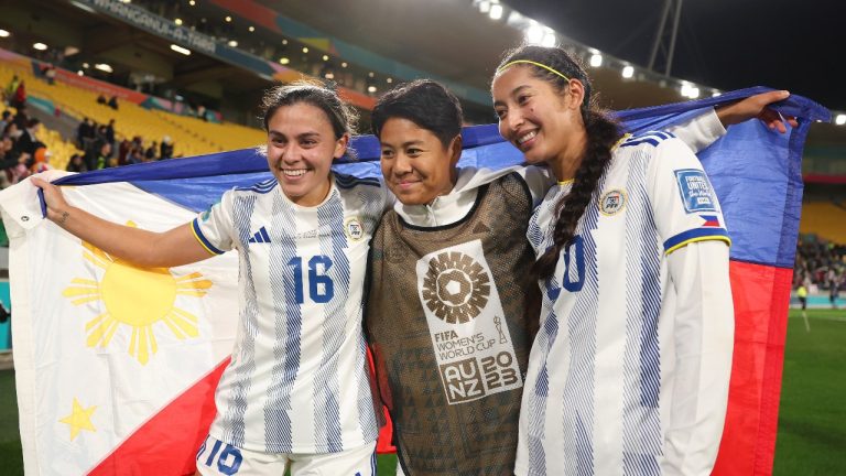  (L-R) Sofia Harrison, Meryll Serrano and Quinley Quezada of Philippines celebrate the team's 1-0 victory in the FIFA Women's World Cup Australia & New Zealand 2023 Group A match between New Zealand and Philippines at Wellington Regional Stadium on July 25, 2023 in Wellington, New Zealand. (Catherine Ivill/Getty Images)